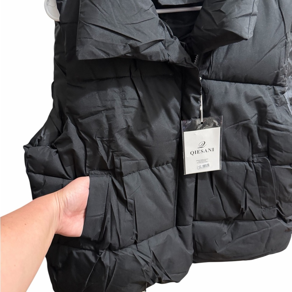 Women’s black puffer vest by Qiesani! New with tags! Has 2 pockets on each side! - Picture 5 of 6